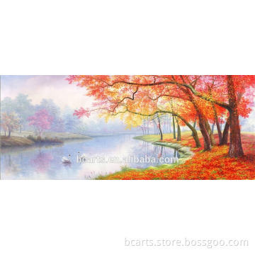 Amazing red maple forest with two swans in the lake